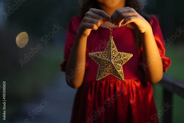 Obraz A little girl is happy to join the christmas day.