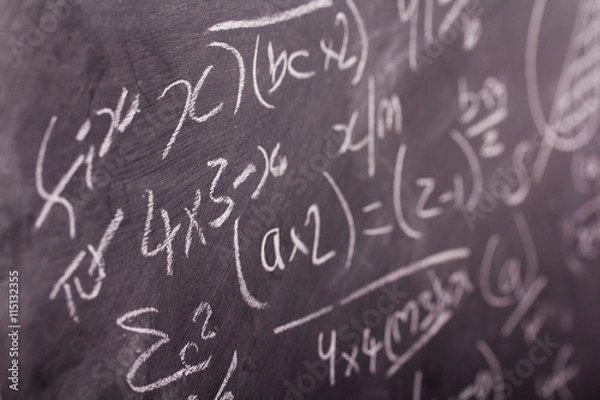 Fototapeta Close up of blackboard with maths equations