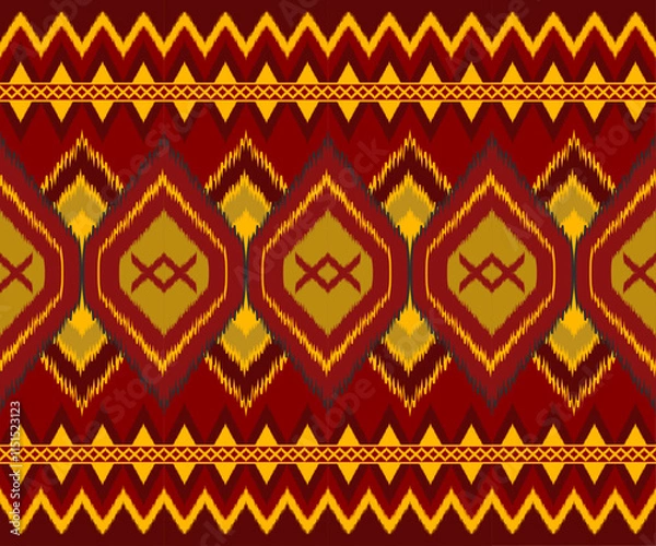 Fototapeta Vibrant geometric pattern featuring diamonds and zigzags in red, yellow, and gold tones, perfect for textiles or backgrounds