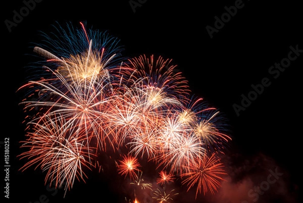 Fototapeta Fireworks light up the night sky