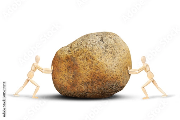 Fototapeta Two men push a huge stone to each other. Abstract image with wooden puppets