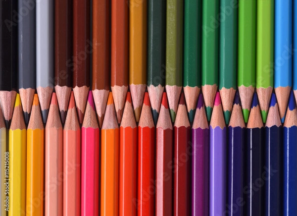 Fototapeta Background of colored pencils with the tips facing aligned