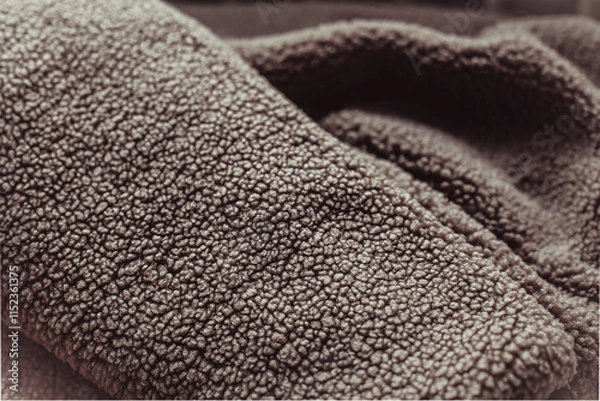 Fototapeta Color of the Year 2025 Mocha Mousse color. Chocolate or Brown Background. Close-Up of Brown Textured Wool Surface with Dense Abstract Patterns