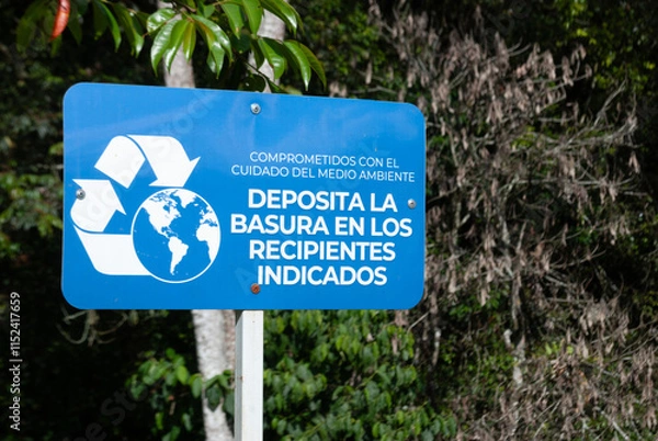 Fototapeta Signage to promote the proper disposal of garbage in the park, focused on the care and preservation of the environment.