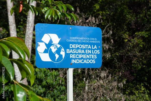 Fototapeta Signage to promote the proper disposal of garbage in the park, focused on the care and preservation of the environment.