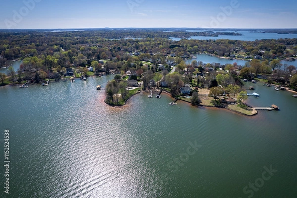 Fototapeta Residential area of Lake Norman from sky over Davidson, North Carolina