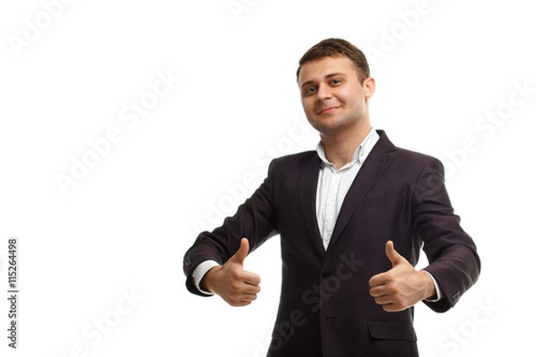 Obraz Handsome businessman showing thumbs up