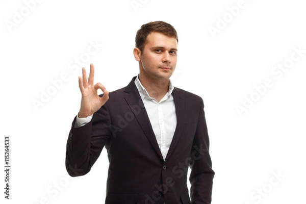 Obraz Handsome businessman shows okay gesture