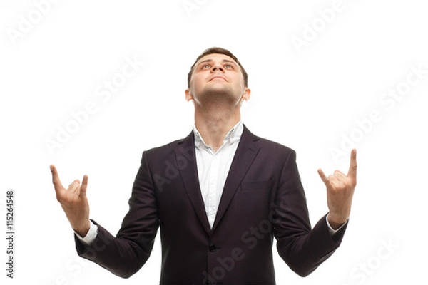 Obraz Handsome businessman shows rock gesture