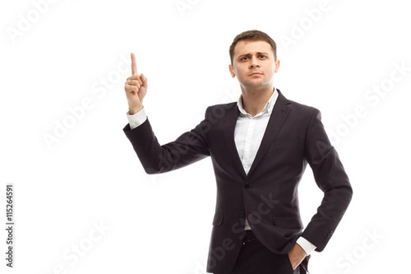 Obraz Handsome businessman shows finger forward