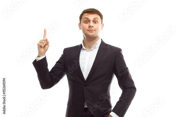 Obraz Handsome businessman shows finger forward