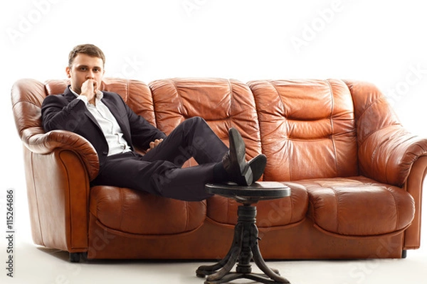 Obraz Thinking businessman  holding his chin