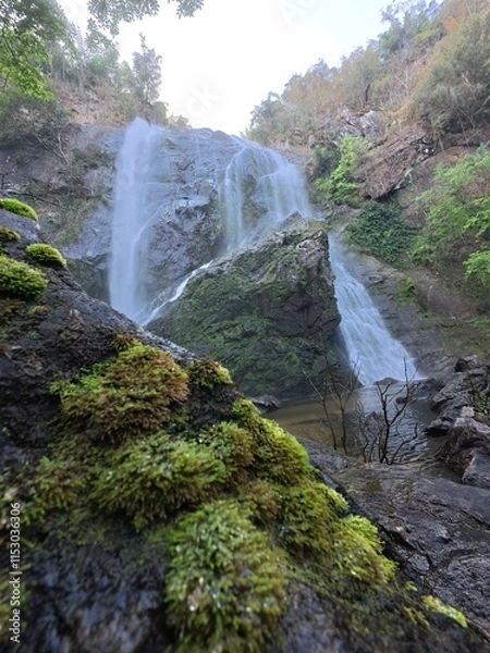 Fototapeta Khlonglan waterfall with moss in rainforest