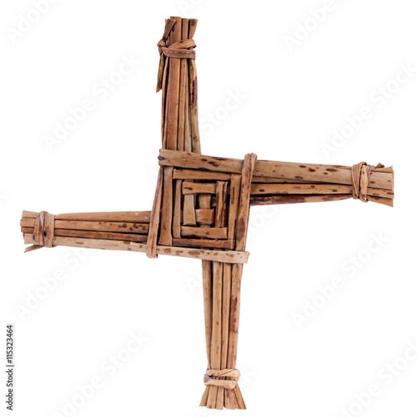 Fototapeta Saint Brigid's cross made from  straw isolated on white. 1 February is St. Brigid's feast day.  Brigid's Cross blessed the house and  protected it from fire and evil
