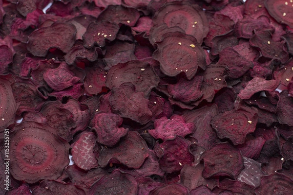 Obraz Beet vegetable chips, vegetable background, dried beetroot slices, frips, beet slices, selective focus