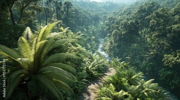 Fototapeta Lush tropical landscape with a winding river surrounded by dense greenery and ferns.