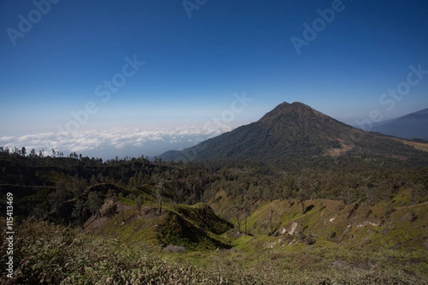 Fototapeta View from the tropical forest with path to the volcano Kawah Ije