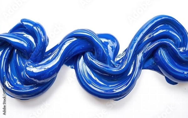 Fototapeta A thick stream of vivid blue paint twisting and curling against a clean white background