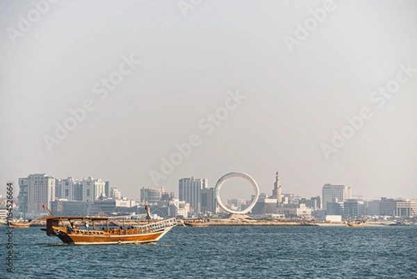 Obraz Tour boat and city sea view in Doha, Qatar