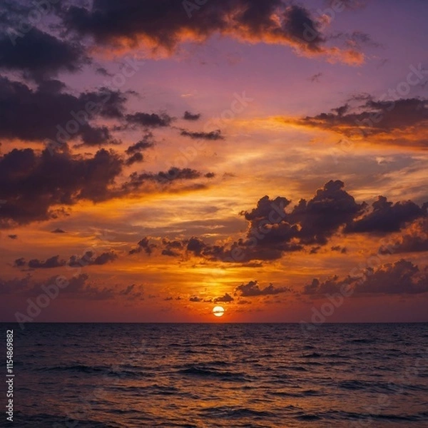 Fototapeta Create a breathtaking scene of a sunset in the sky, showcasing vibrant hues of orange, pink, and purple as the sun dips below the horizon.

