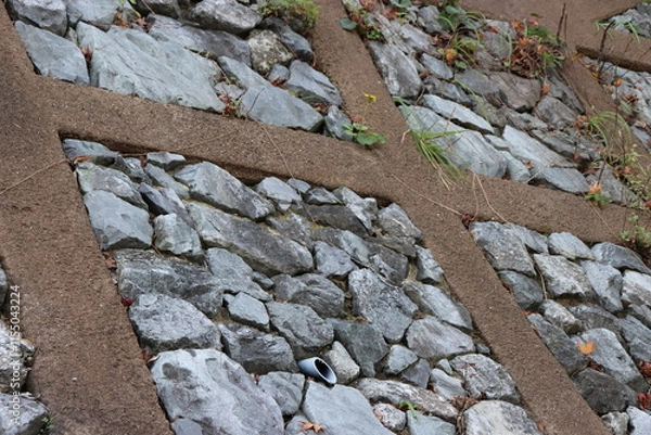 Obraz 法枠と中に敷き詰めた石のアップ