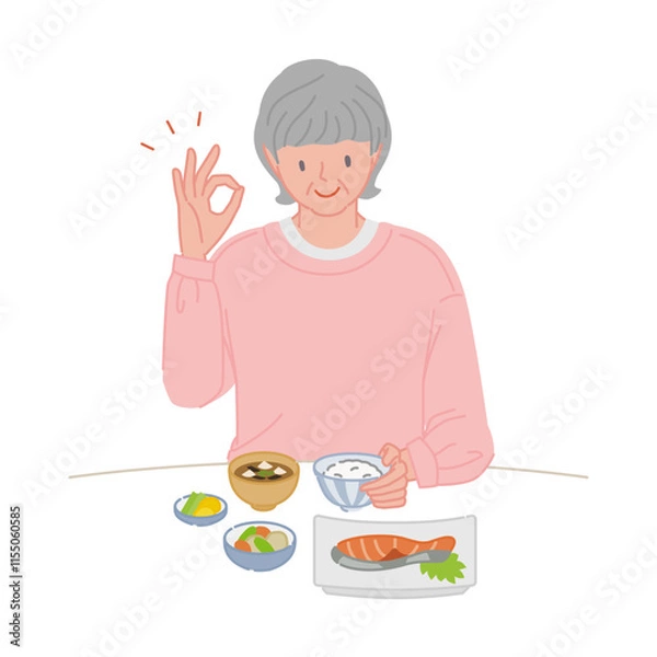 Fototapeta 食事に手で丸のポーズをする笑顔のシニア女性（ひとり暮らし）