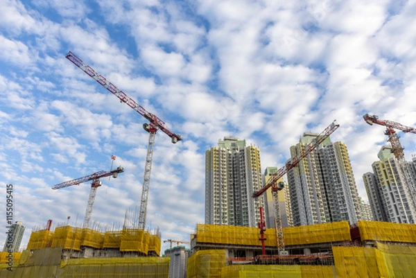 Fototapeta DEC 16 2024,Hong Kong.Construction site and Dense residential area in Kai Tak area