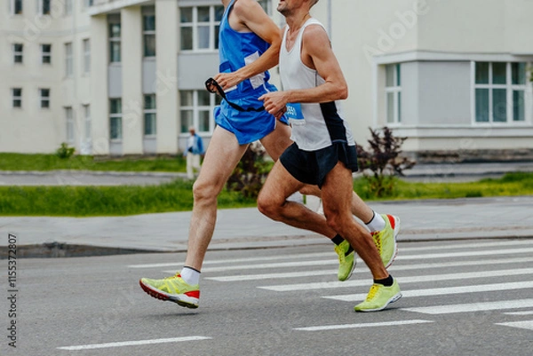 Obraz blind runner with his guide running city marathon