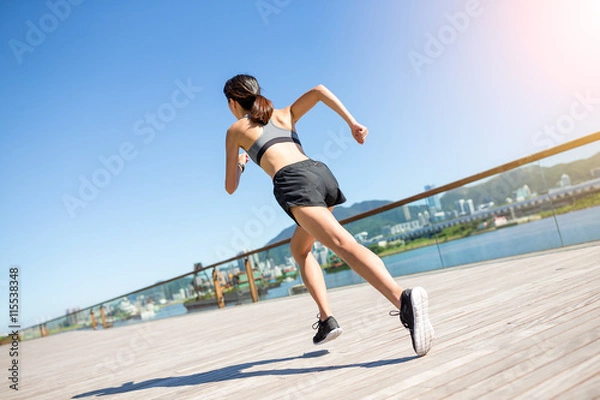 Obraz Woman running in the city