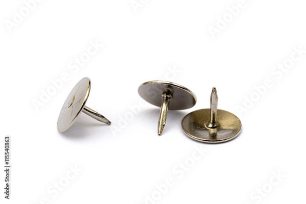 Fototapeta Ordered pile pushpins isolated on white background