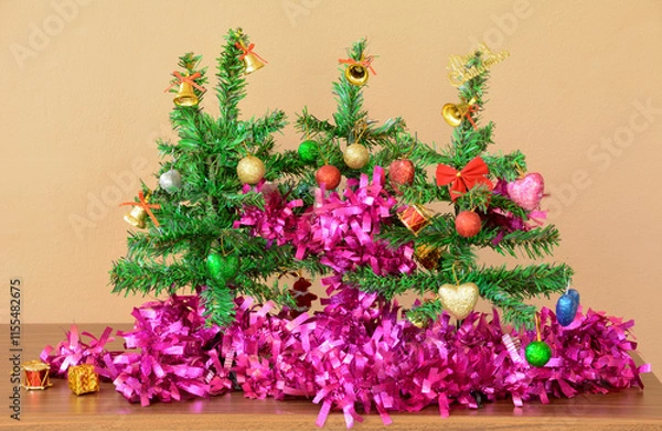 Obraz Small Christmas Tree with Decorative line and Gift Boxes on Table