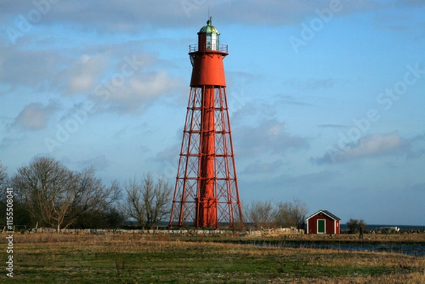 Obraz red lighthouse in the country