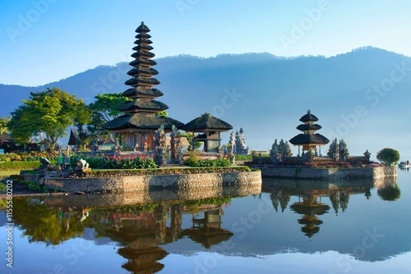 Fototapeta Morning view of Ulun Danu Beratan Temple on the lake. The most iconic and famous temple in Bali surrounded by mountains