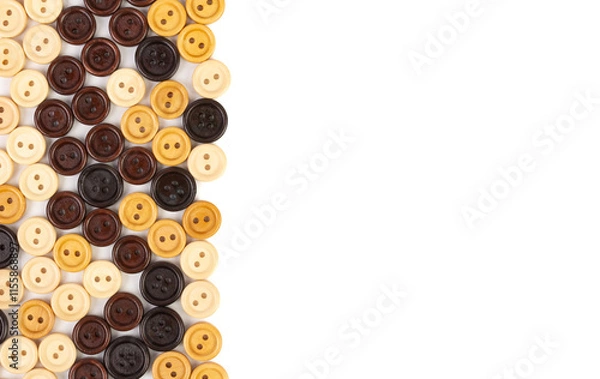 Fototapeta Wooden multicolored buttons on a white background