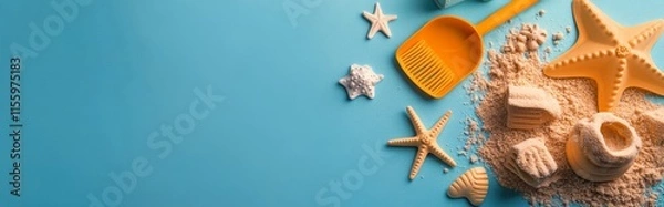 Fototapeta Bright beach toys and seashells arranged on a vibrant blue background for summer fun
