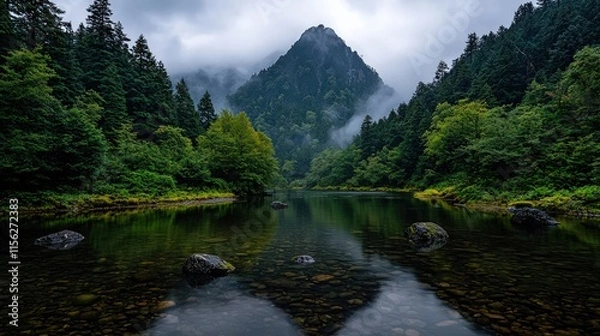 Obraz Tranquil River Flowing Gently Through Smooth Stones Surrounded by Lush Greenery Under a Clear Blue Sky Evoking Peaceful Natural Serenity and Harmony