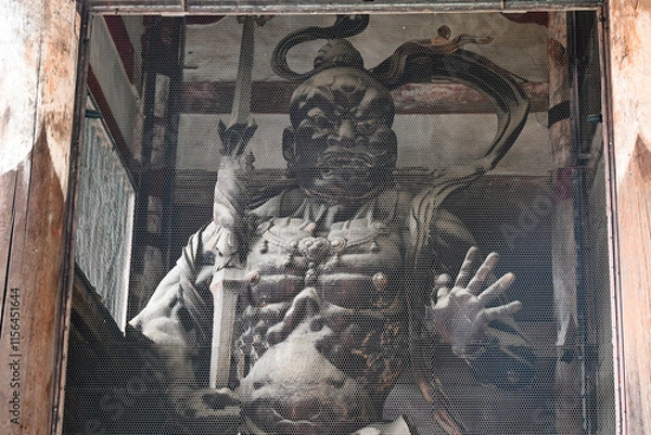 Obraz 運慶・快慶によって彫られた東大寺南大門の金剛力士像