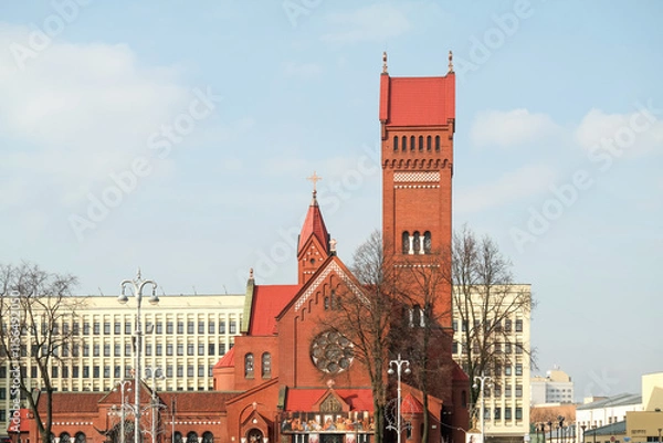 Fototapeta The building of the red church on the central square in Minsk (Belarus)