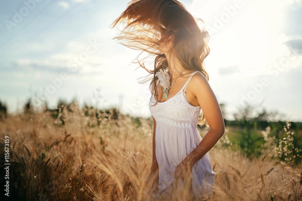 Fototapeta Beautiful woman in barley fields