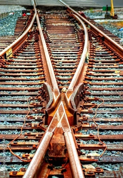 Fototapeta Railroad  track Switch Direction and Merge into shipping customer spurs Hdr effect