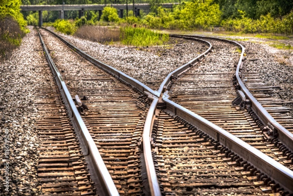 Fototapeta Railroad  track Switch Direction and Merge into shipping customer spurs