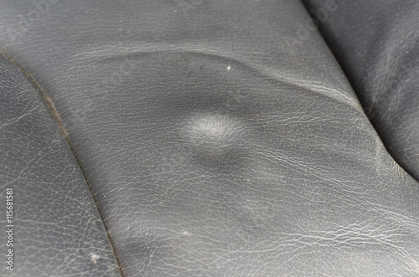 Obraz Dent on leather seat