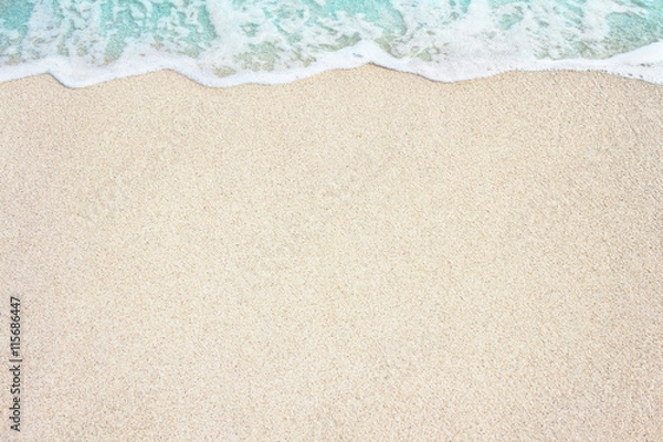 Fototapeta Soft ocean wave on the sandy beach, background.