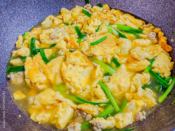 Fototapeta Thai omelet soup with minced pork.