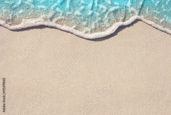 Obraz Miękka fala oceanu na piaszczystej plaży, tło.