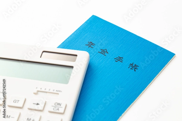 Fototapeta 白背景に電卓と年金手帳