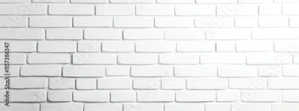 Fototapeta Smooth white brick wall texture offering a minimalist and modern backdrop, ideal for use in design and construction projects requiring a clean, stylish surface.