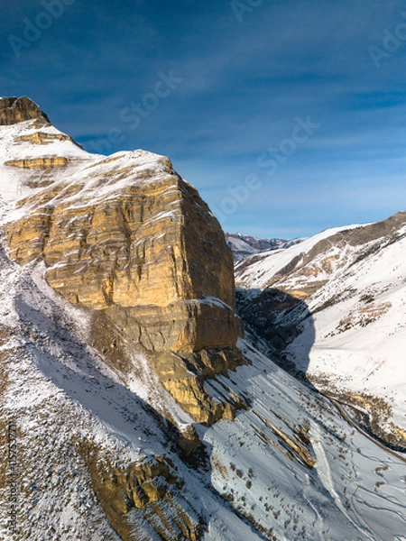 Fototapeta Beautiful aerial view of a mountain range with high cliffs. Landscape and nature of the North Caucasus