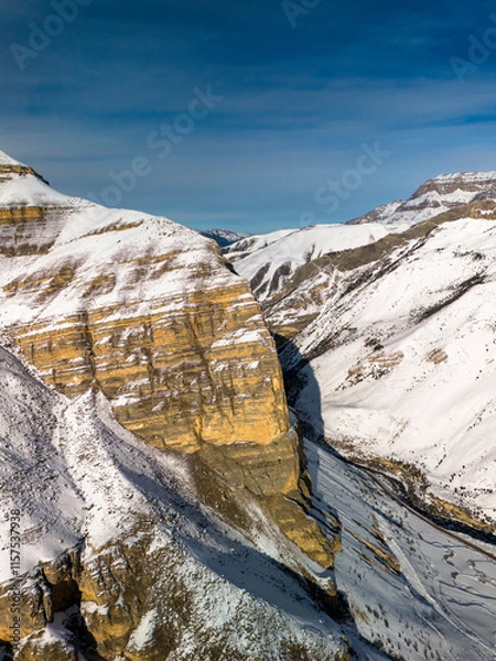 Fototapeta Beautiful aerial view of a mountain range with high cliffs. Landscape and nature of the North Caucasus