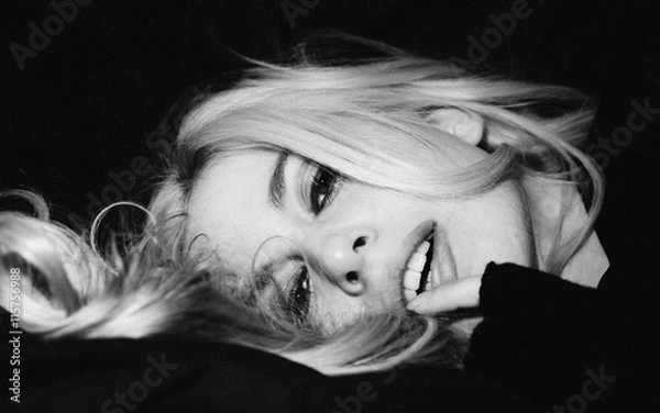 Obraz beautiful girl lying on a couch 